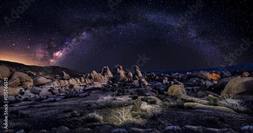 View of the Milky Way Galaxy at the Joshua Tree National Park.  The image is an hdr of astro photography photographed at night.  It depicts science and the divine heaven.