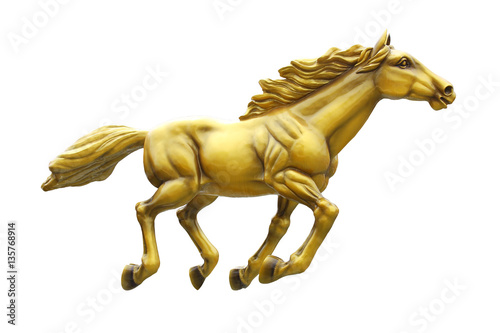 Golden horse statue isolated on white background photo