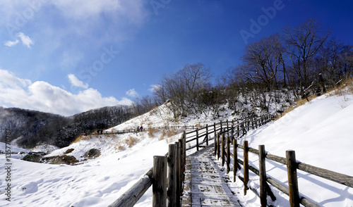 Noboribetsu onsen and walkway bridge snow winter © polarbearstudio