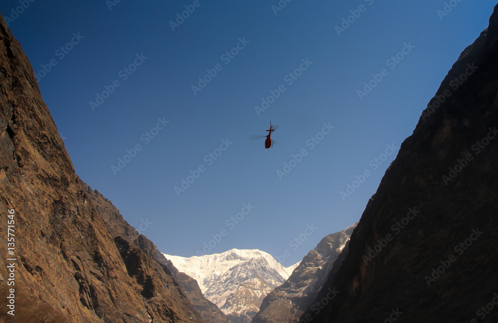 Lifeguard helicopter in Himalaya mountains in Nepal