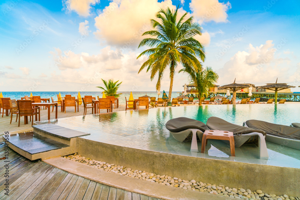Fototapeta premium Table and chairs at restaurant in tropical Maldives island .