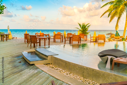 Fototapeta Naklejka Na Ścianę i Meble -  Table and chairs at restaurant in tropical Maldives island .