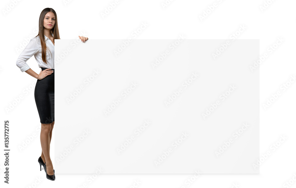 Businesswoman in official clothing is holding side of blank banner isolated on white background Businesswoman in official clothing is holding side of blank banner isolated on white background