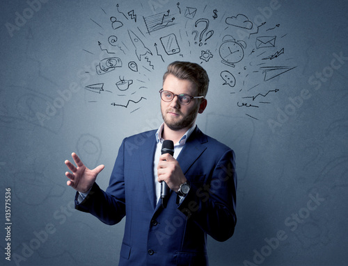 Businessman holding microphone