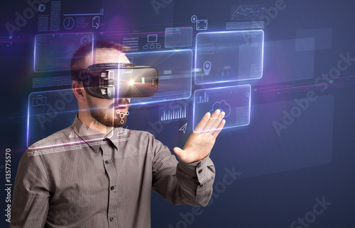 Obraz na płótnie Businessman with virtual reality goggles w salonie