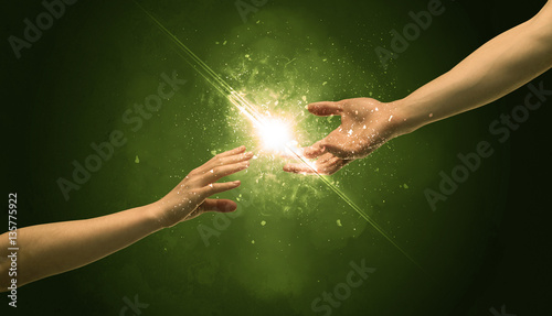 Touching arms lighting spark at fingertip