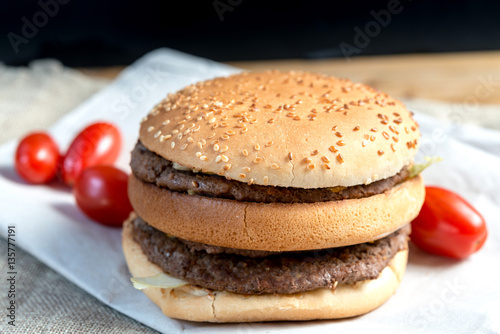delicious American cheese burger with tomato