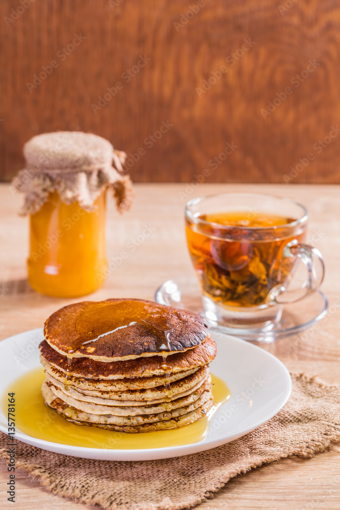 Pancake with honey and tea Pancake with honey and tea