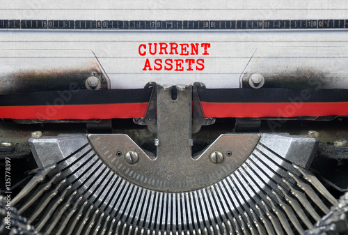 CURRENT ASSETS Typed Words On a Vintage Typewriter Conceptual