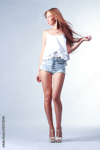 young woman in blue short