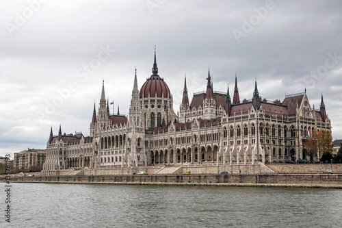 Hungarian parliament in Budapest on the Danube river at autumn