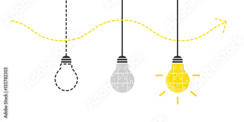 Innovation concept with light bulb made of jigsaw puzzle pieces in the end