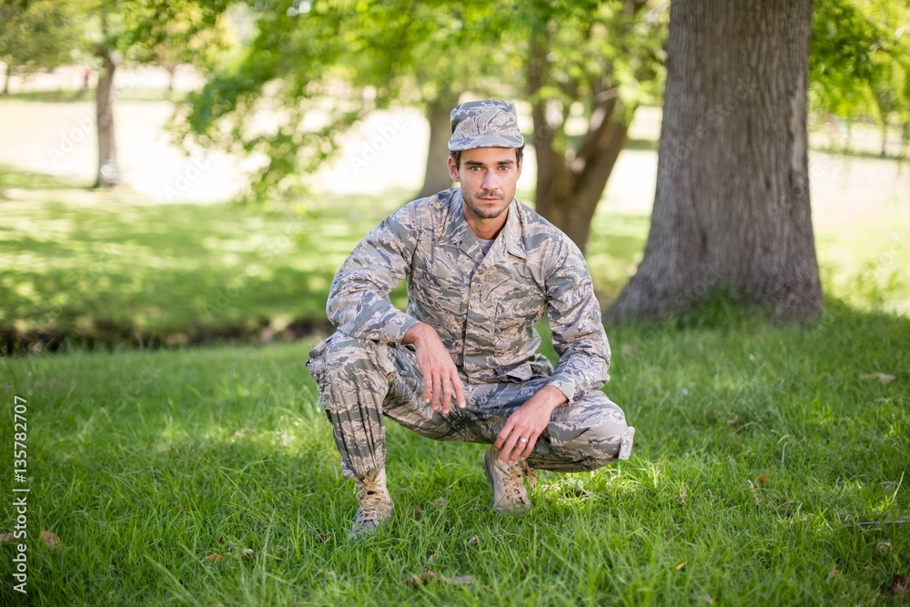 Portrait of soldier smiling in park