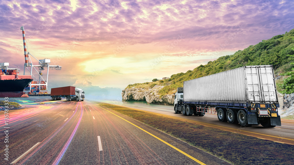 Logistics import export background and transport industry of Container truck on the road with Cargo ship at sunset sky