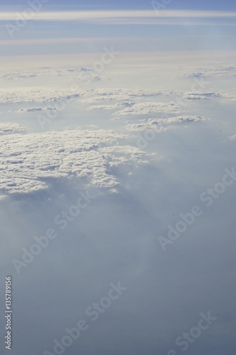 sunlight shed on clouds and mist shot on air plane