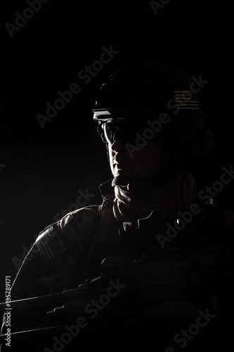 United states Marine Corps special operations command Marsoc raider. Contour backlit studio shot of Marine Special Operator black background