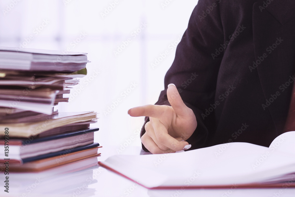 Businesswoman in problems. Alone working in office with a lot of
