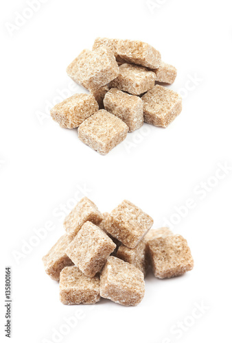 Pile of brown sugar cubes isolated