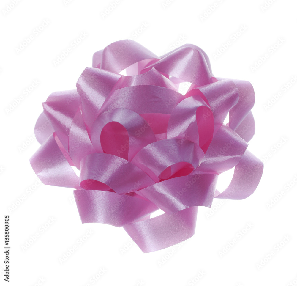 Pink bow is isolated on a white background. Pink bow is isolated on a white background.