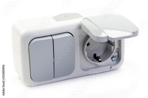 White Electric Socket and Switch on White background. 