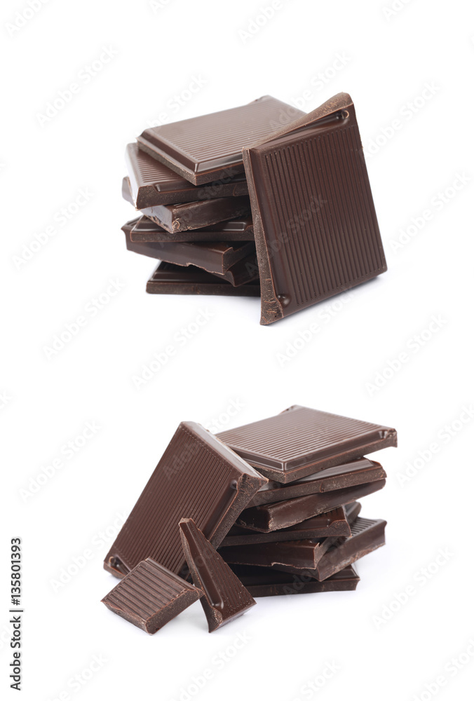 Pile of chocolate bar pieces isolated Pile of chocolate bar pieces isolated
