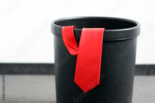 Red Power Tie in Garbage Can