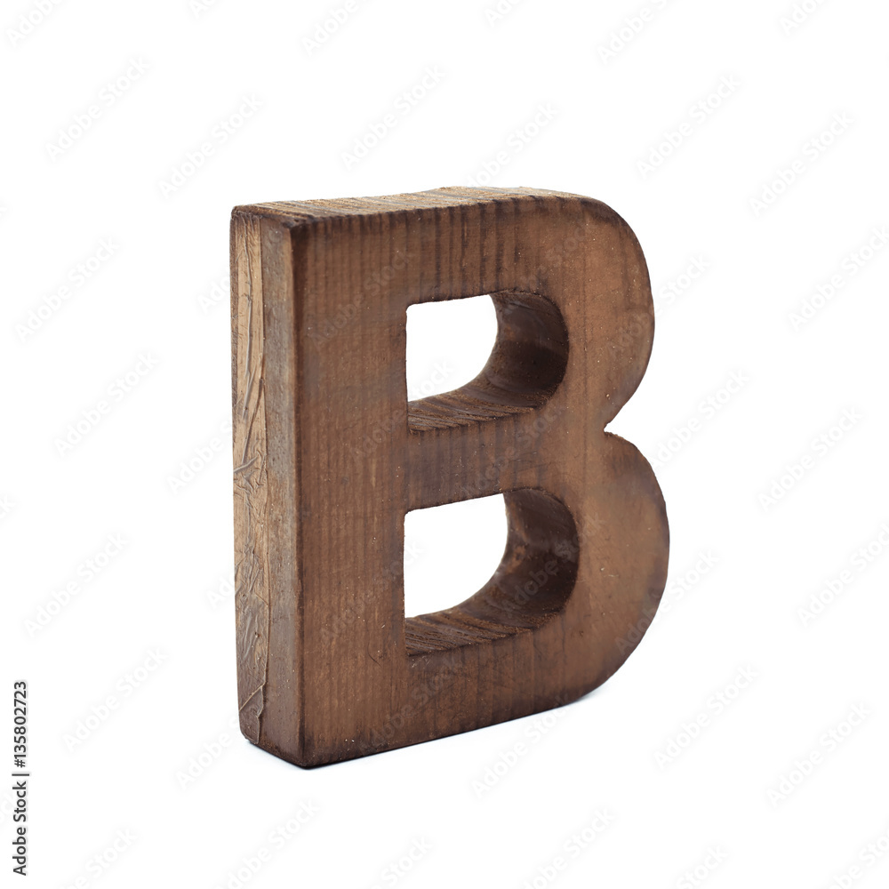 Single sawn wooden letter isolated Single sawn wooden letter isolated