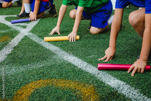 Students boy prepare to leaving the starting for relay race boy at school sports day. School sports day concept.