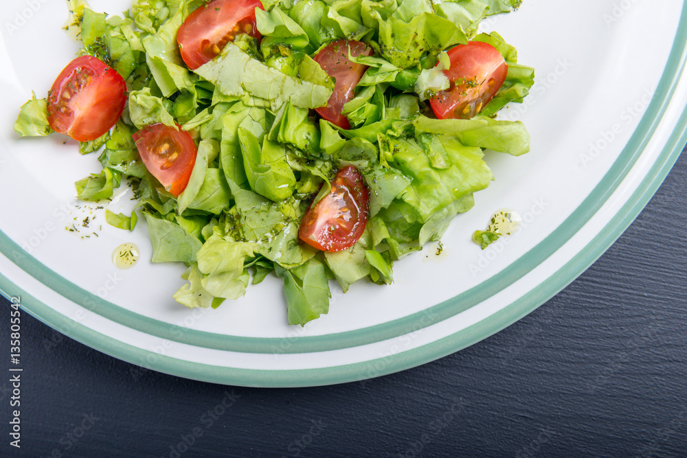 Fresh salad- lettuce with cherry tomatoes