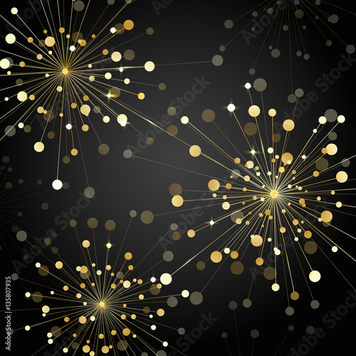 Gold fireworks on dark background
