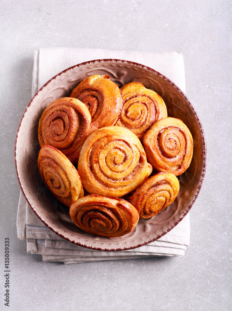 Fototapeta premium Cinnamon swirl buns in a bowl