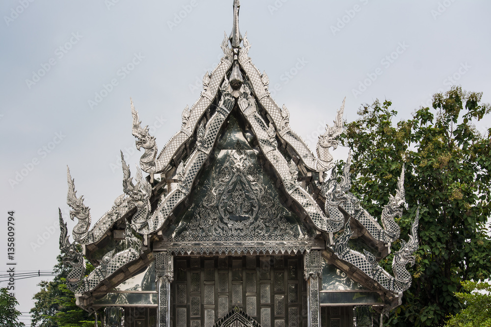 Buddhist temple decorated from stainless steel both outside and inside Wat Pho Rattanaram in Ratchaburi Thailand. Buddhist temple decorated from stainless steel both outside and inside Wat Pho Rattanaram in Ratchaburi Thailand.