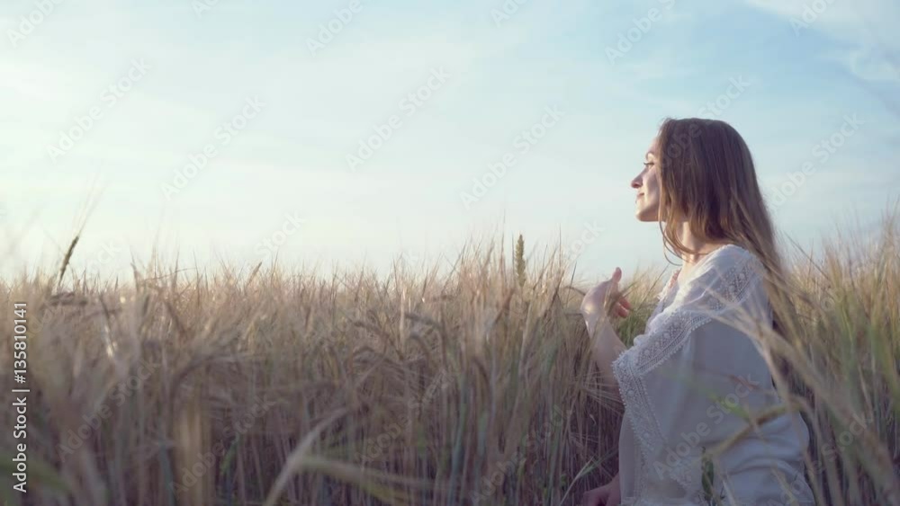 Beautiful woman in a wheat field Beautiful woman in a wheat field