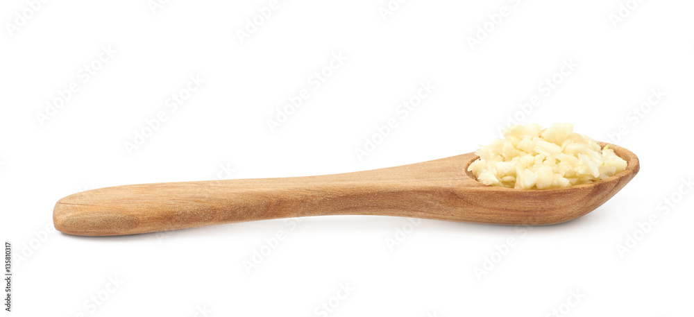 Spoon of minced garlic isolated Spoon of minced garlic isolated