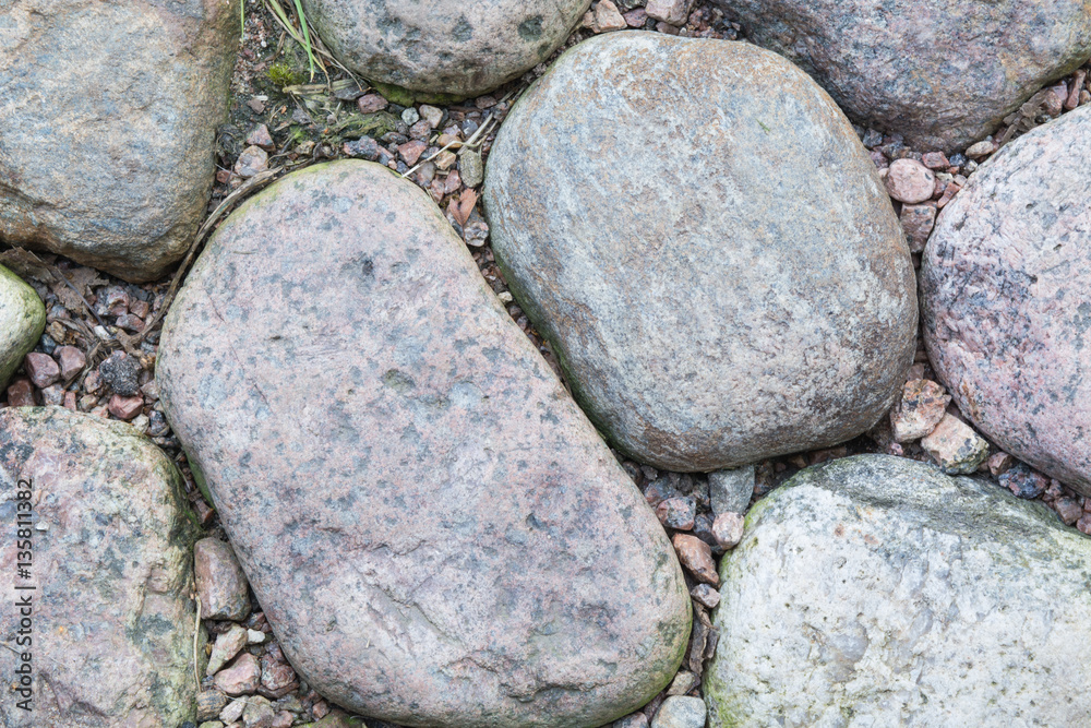 Old road paved of stones. Cobble background Old road paved of stones. Cobble background