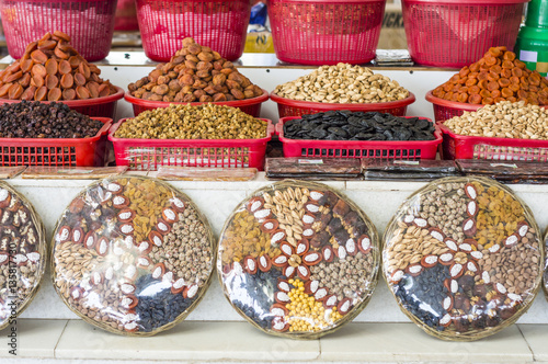 The stall with dried fruits at the Siab Dekhkhan Bazaar offers different raisins, apricots, prums and figs in Samarkand, Uzbekistan