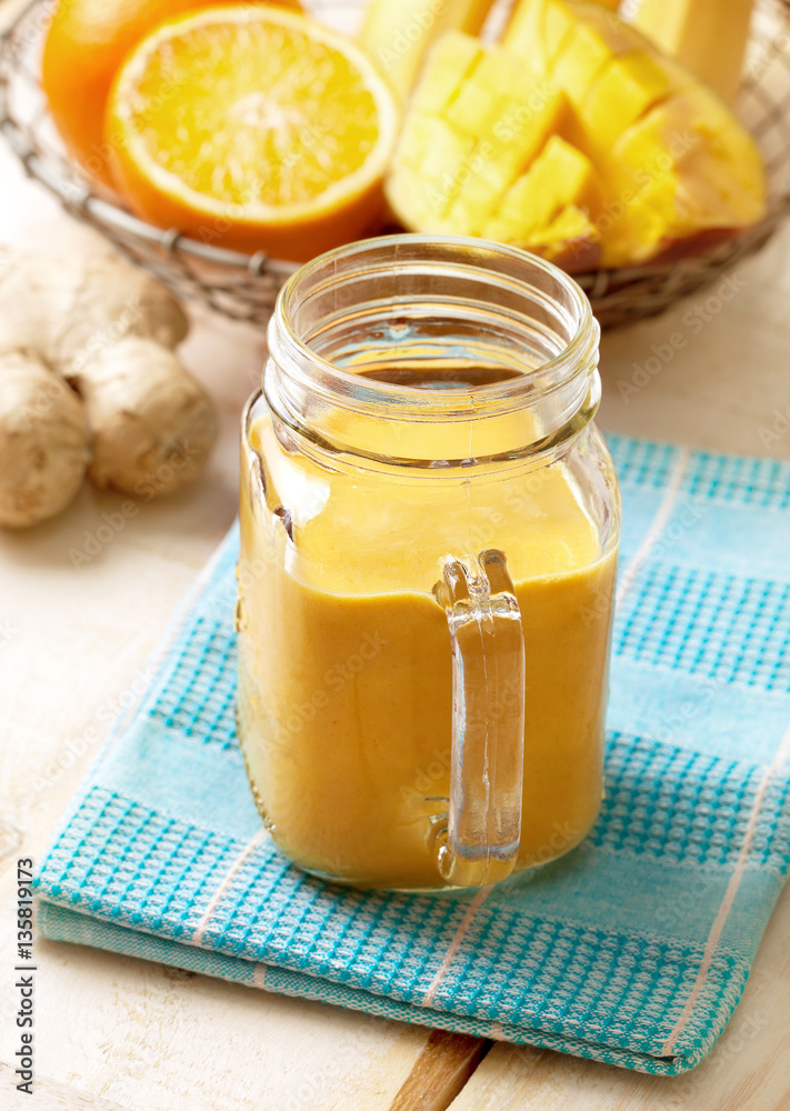 detox smoothie of banana, orange, mango, ginger detox smoothie of banana, orange, mango, ginger