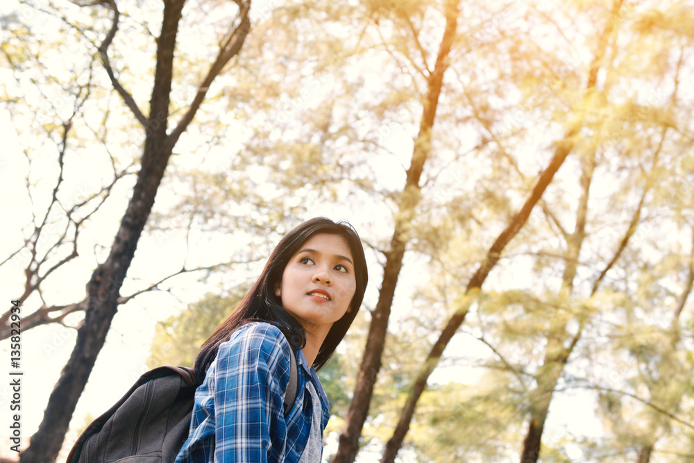 Asian women in nature and relax time on holiday.concept travel color of vintage tone Asian women in nature and relax time on holiday.concept travel color of vintage tone