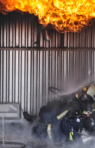 Firemen in flashover photo