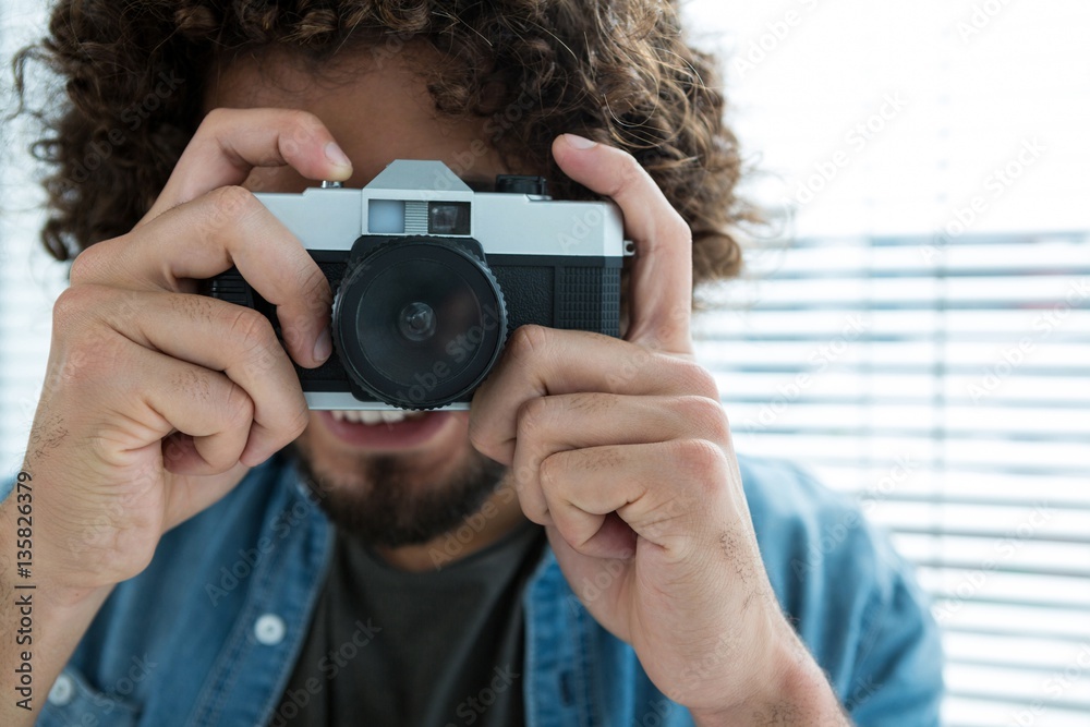 Male photographer with old fashioned camera Male photographer with old fashioned camera