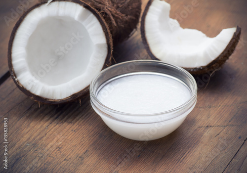 Coconuts and organic coconut oil in a glass jar