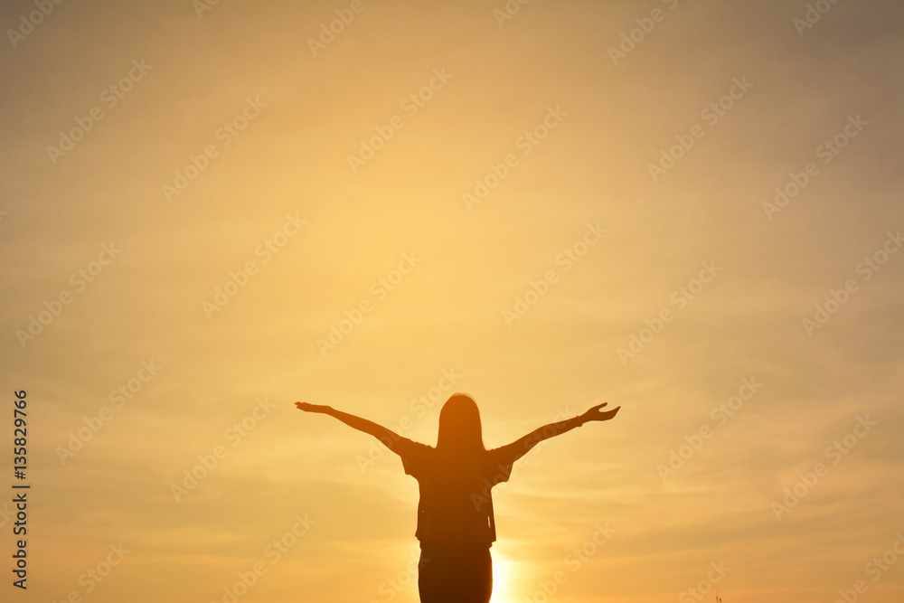 Silhouette of happy women relax in the nature concept travel at the sunset