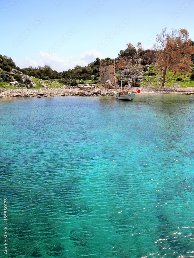 Fishing boat-partly sunken ruins-Kekova island. Ancient city of Simena-Turkey. 1081