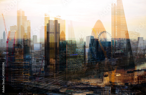 City of London at sunset,  Multiple exposure image with night lights reflections. 
