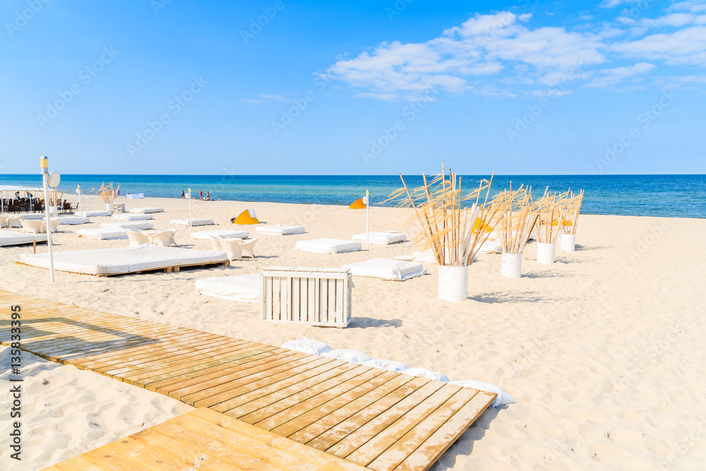 Sunbeds on Jurata beach, Baltic Sea, Poland Sunbeds on Jurata beach, Baltic Sea, Poland