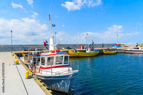 Colorful fishing boats anchoring in Kuznica port on Hel peninsula, Baltic Sea, Poland