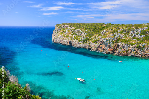 View of Cala Porter bay with turquoise sea water, Menorca island, Spain