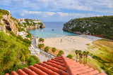 View of beautiful beach of Cala en Porter, Menorca island, Spain