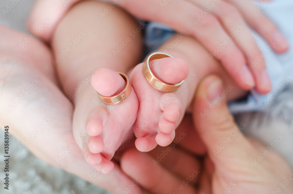 Baby hands and fashion feet at night