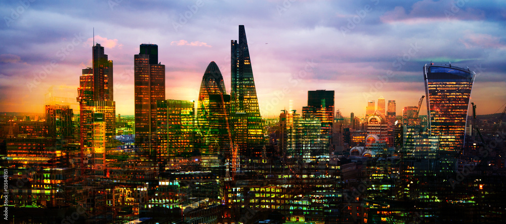 Fototapeta City of London at sunset, Multiple exposure image with night lights reflections.